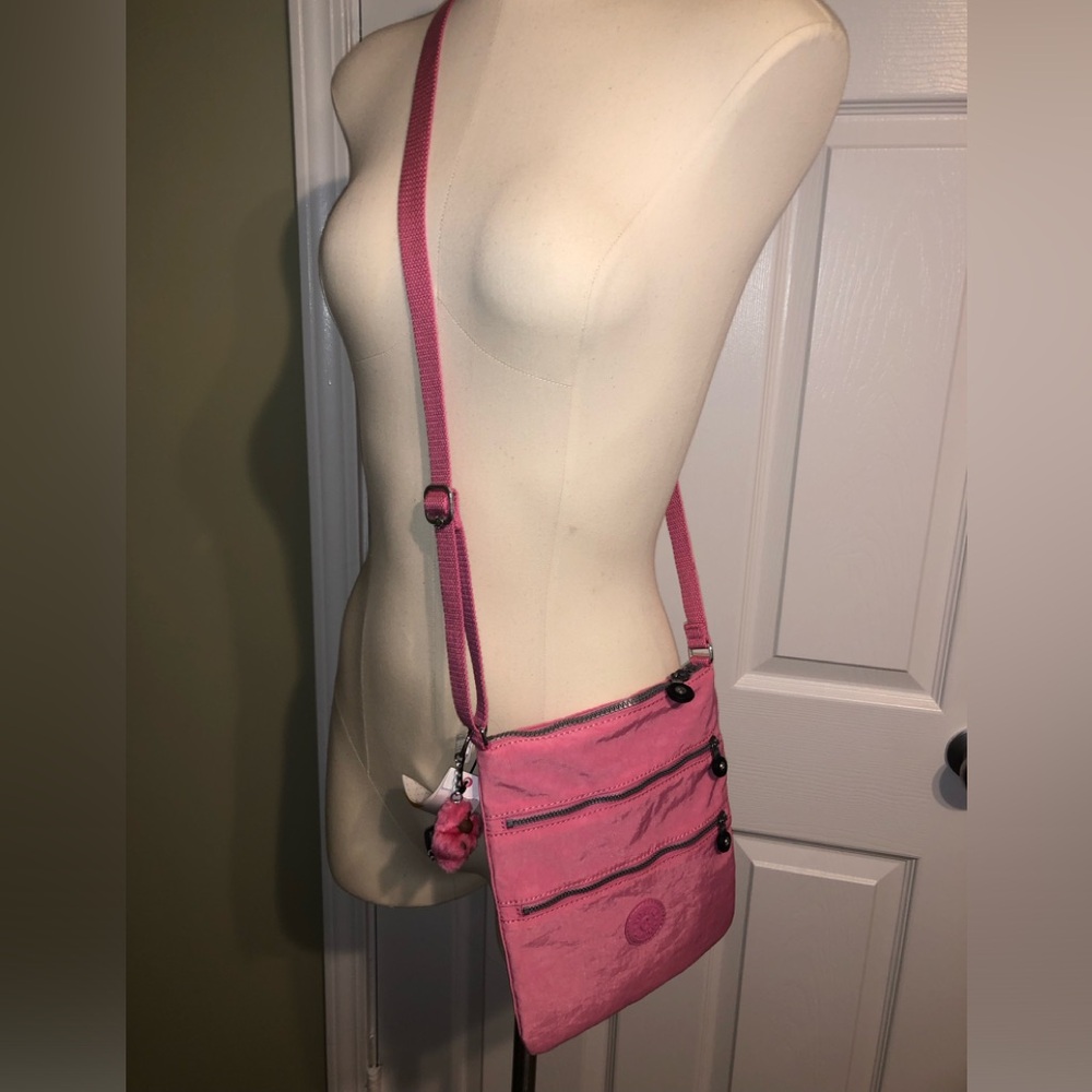 New pink with tag and monkey.